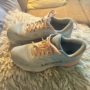 Woman’s Hoka One on One running shoes size 9.5 grey and coral.